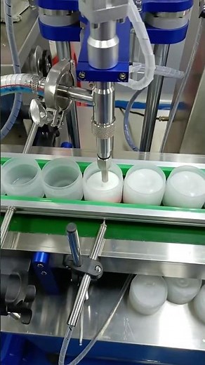 Fully automatic single-head filling machine suitable for filling pastes, liquids, granules etc.