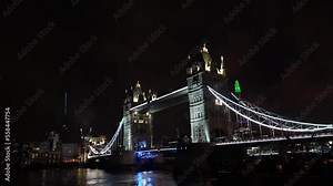 Fireworks next to Tower Bridge landmark building. 4K video with the celebration of the New Year Eve in London.