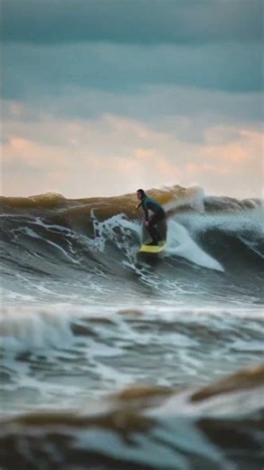 Surfer Takes On Massive Green Wave in Rough Ocean!