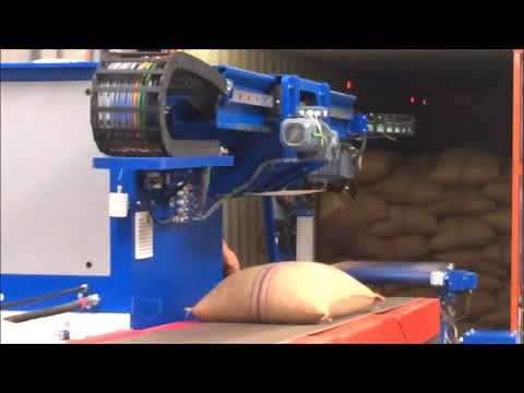 Semi-automatic heavy jute bag unloading from a container with the Copal C2 system.