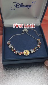 Witness memories of Disney's Mickey Mouse through the years shine in this beaded bracelet. Shop Now! | The Bradford Exchange