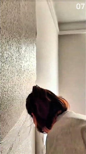 Applying textured wall coating using long-handled roller tool