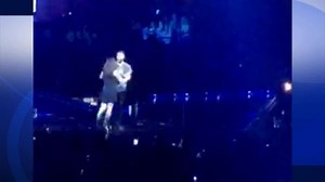 An overzealous fan caught Adam Levine off guard when she ran onto stage during a concert at the Honda Center in Anaheim. http://abc7.la/1FyA2b8 | ABC7