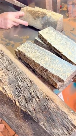 Operating surface planer on raw wood to create clean even smooth plank surfaces in woodworking