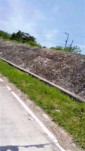 Messages Of The " Fan - Like ,Or " Air - Con Style Panels On Highway Barriers