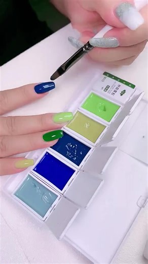 Colorful nail polish #colorfulnailart #nailpolish #nailsart | 𝙏𝙖𝙩𝙩𝙤𝙤𝙨