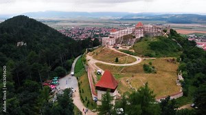 Beautiful Rasnov fortress in restoration process, Rasnov city in the background. Summer 2021 Stock Video