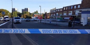 The scene in the wake of a serious assault outside shops in Maypole as police cordon remains in place