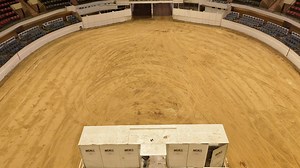 Here's a look at the stripped down version of the historic Will Rogers Coliseum, home of the NCHA Triple Crown Cutting Horse Events. We flew a drone around to take a closer look at all the angles and dimensions that makes this arena set up the best place in the world to show a cutting horse. | Performance Horse Central