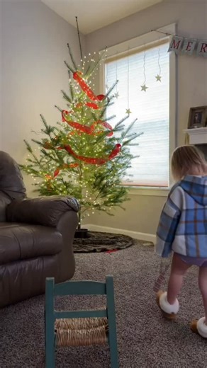 Buckaroo Chew LLC | Natural Baby Teething Toy on Instagram: "First time hanging an ornament. #buckaroochew #advenguresofatoddler #toddlerlife #christmas #tree"
