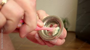 cleansing the docking ring on the shell from the rust accumulated dirt and bacteria with a special tool