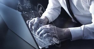 A Man on a Laptop Works with an AI