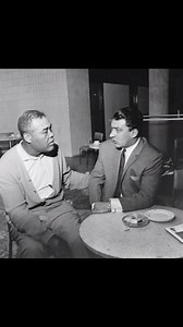 Ronnie Kray talking with American Boxer Joe Louis at Gatwick Airport. | The Kray Brothers