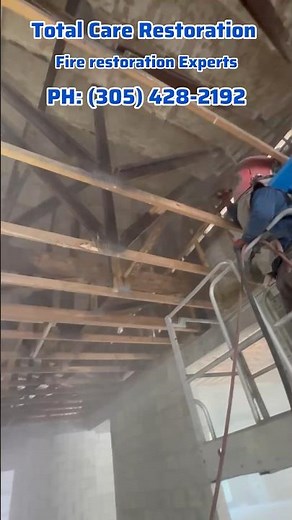 Sand Blasting Roof Framing After a Fire