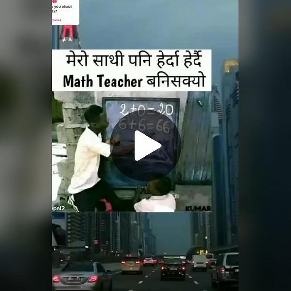 Math Teacher Demonstrates Equations on Chalkboard