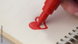 acrylic marker. Abstract art, painting shapes. Marker for watercolor painting makes a line on white paper. Painted sign of a master. On the desktop, next are other painted art prints.