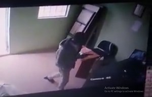Armed gangster caught on camera robbing an office – VIDEO