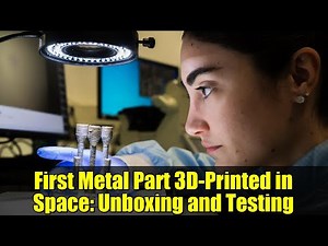 First Metal Part 3D-Printed in Space: Unboxing and Testing
