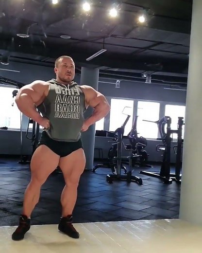 Beefy muscle bull (ID?) with amazing legs flexing and posing
