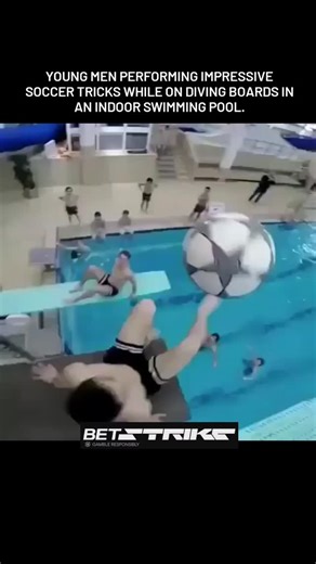 PrankInTheDark on Instagram: "The video shows several young men performing impressive soccer tricks while on diving boards in an indoor swimming pool. Some of the tricks involve juggling the ball with their feet, knees, and head while moving along the board, and even passing the ball to each other while one person is on a higher board. The video also shows some of the men diving into the pool while performing a trick with the soccer ball. The atmosphere is energetic and fun, and the participants