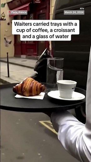 Paris waiters race through the streets