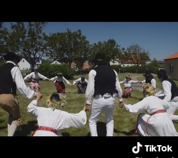 Midsummer Play-Dances Around the Maypole in Sweden