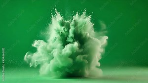 Green powder exploding, captured in mid air against a green screen background, creating a dynamic and vibrant cloud of particles