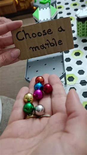 Exciting Marble Race: Seven Marbles, One Winner!