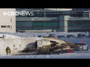 Watch passengers escape from flipped plane on a Toronto runway