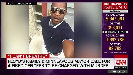 With police stationed on rooftops, crowds gather for second day in Minneapolis to protest death of George Floyd