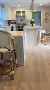 Here’s what we did to update our kitchen on a budget! 1. Refaced cabinets 2. Replaced countertops with quartz 3. Painted the walls Benjamin Moore shoreline gray 4. Refinished our existing floors to make them lighter 5. Added a backsplash and new pendant lights Shop this space and more by clicking the link in my bio💙 | KBdesign02025