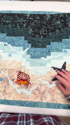 This sweet little wall hanging/table topper came from a block exchange between my customer and a group of ladies. It features a Bargello-style block pattern with adorable appliqué—crabs, shells, and starfish. Quilted with Frozen Swirls by Anne Bright, and I added the binding here in the studio. Ready to head back to its owner at my Harrisonburg/Stanton stop on Thursday. #LongarmQuilting #SnowbirdQuilts #BargelloQuilt #AnneBrightDesigns