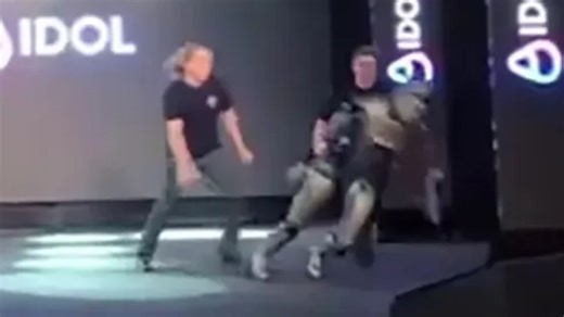 Moment Russia’s new humanoid robot collapses on stage after staggering few steps