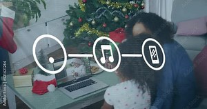 Animation of computer icons in digital circles over mother and daughter watching video on laptop