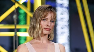 Margot Robbie debuts bold new hair cut at Paris Fashion Week