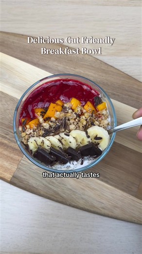 Ad A delicious gut healthy breakfast bowl that tastes like a dessert. @activia.uki I used activa strawberry kefir 280g. *Activia contains calcium which contributes to normal function of digestive enzymes. Enjoy as part of a balanced diet & healthy lifestyle Ingredients: 80g Raspberries ~5.2g fibre 20g Chia seeds ~6.9g fibre 9 mini cubes (~45g) Mango ~0.7g fibre ½ banana ~1.3g fibre 1 square (~10g) 70% dark chocolate ~1g fibre #ad #Activiamorningritual #yogurtbowl #breakfast #yogurt