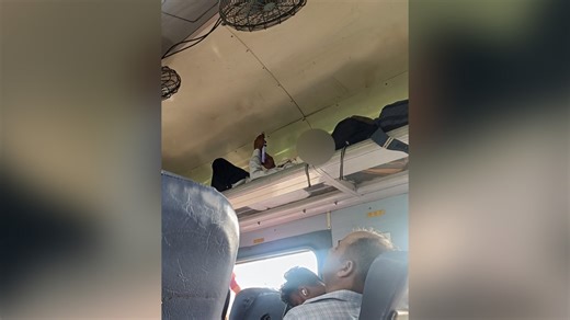 Indian Railways passenger lies on luggage rack of chair car, pic goes viral