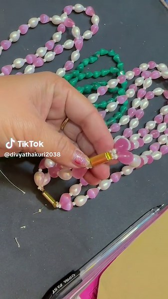 Elegant Bead Stringing Techniques with Pink and White Beads