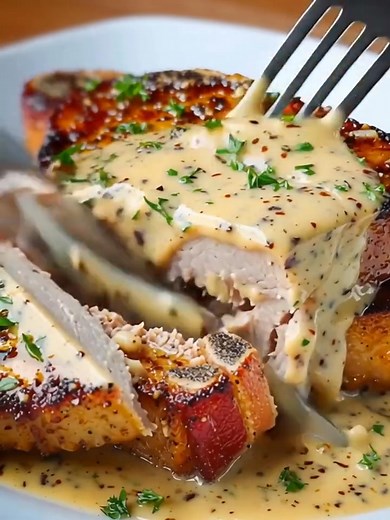 12K views · 18 reactions | Maple Bacon Pork Chops with Dijon Mustard Cream Sauce Ingredients: 4 bone-in pork chops (about 1 inch thick) 4 slices of bacon, chopped 1 tablespoon olive oil Salt and pepper, to taste 1/2 cup maple syrup ...... Full Recipe in Coʍmеոτ  | Recipes by Mamas | Facebook