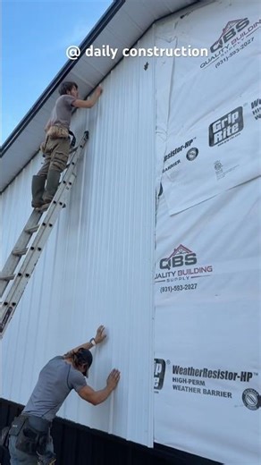 Putting the gable metal on ￼