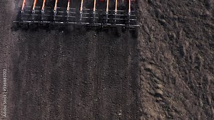Agriculture. land cultivation. cultivator on a heavy tractor does pre-sowing soil cultivation