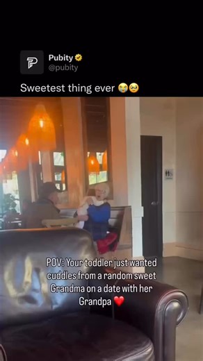 Pubity on Instagram: "🥹 Toddlers have a special talent for finding comfort in the kindest strangers. In a quiet moment, this little one simply followed their heart, reaching out for cuddles from a sweet grandma enjoying a date with her grandpa. No hesitation, just pure trust and warmth. It’s a gentle reminder that love doesn’t always need an introduction. Sometimes, a soft smile and open arms are all it takes to create a beautiful, unexpected connection. Via @alesyakorovnik • #family #wholesome