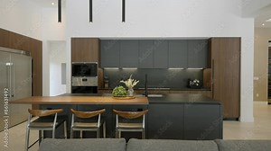 Modern kitchen with dining area. Sleek dark grey cabinetry with integrated appliances and wooden accent. Black pendant lights. Grey sofa in foreground indicating living space