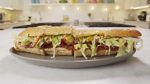14K views · 35 reactions | The grinder salad sandwich has absolutely blown up on TikTok and this is our spin. The crunch iceberg lettuce salad adds a crunchiness that goes perfectly on a toasted Italian sub | Delish | Facebook
