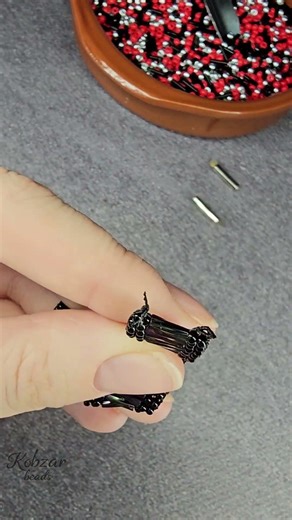 Before putting metal end caps on a beaded bracelet, I always secure the knots with B-7000 glue.