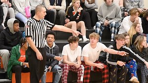 What's it like to be a referee? Go behind the scenes of a basketball game with the crew