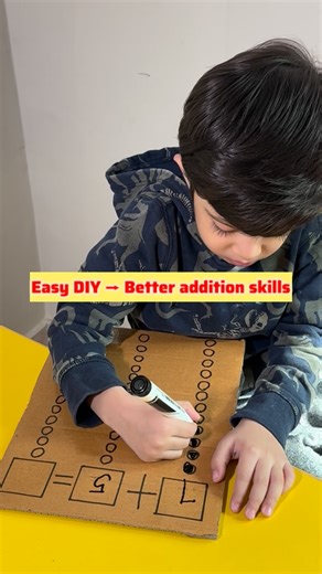 Journey with Junior on Instagram: "Math just got fun — with cardboard! Am Easy DIY for endless practice of addition skills for kids. #explorepage #reelsofinstagram #reelitfeelit #kidslearningfun #kidsfun Kids learning Addition learning Kids activities"