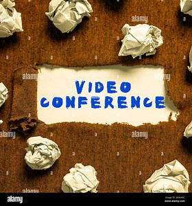Hand writing sign Video Conference. Business concept recording and playing back of moving pictures and sound Typing Online Website Informations Stock Photo - Alamy