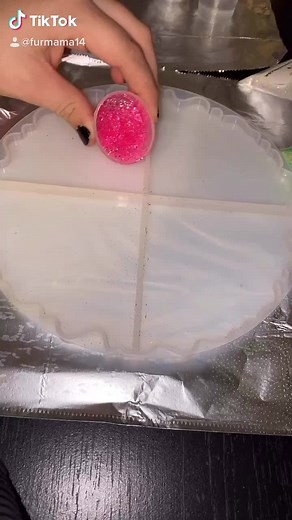 Pouring another geode ridge coaster set 💗💚 who wants to see them finished?! #geodecoasters #epoxy #glitter