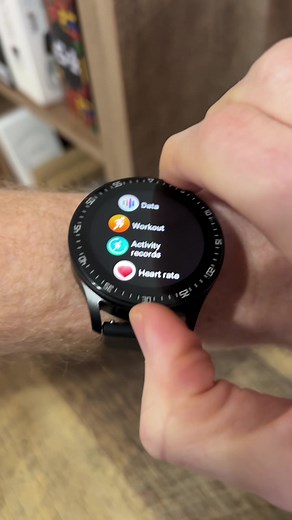 Checking out the X7 smartwatch with built in earbuds!